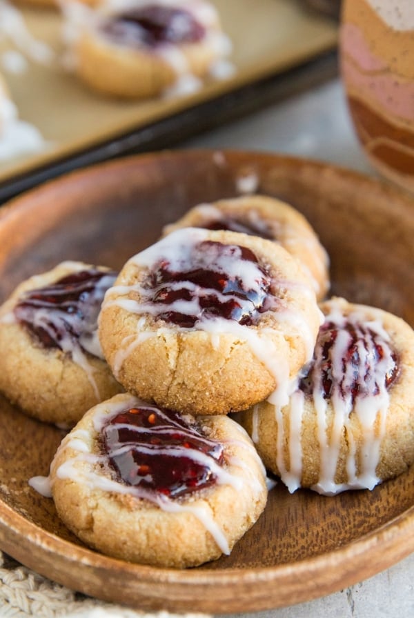 Keto Raspberry Thumbprint Cookies (Vegan, dairy-free, grain-free, egg-free) - these easy thumbprint cookies are a lovely gluten-free Christmas dessert!