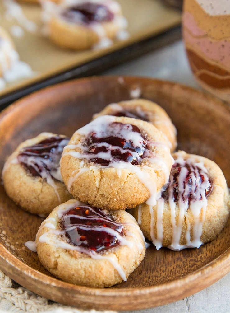 Keto Raspberry Thumbprint Cookies (Vegan, dairy-free, grain-free, egg-free) - these easy thumbprint cookies are a lovely gluten-free Christmas dessert!