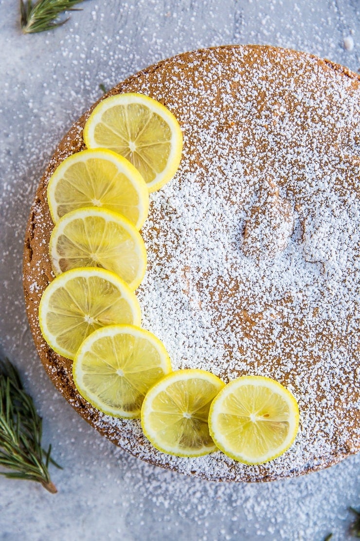 Olive Oil Cake with lemon and rosemary. Grain-free, refined sugar-free, dairy-free, and healthy. A delicious gluten-free cake recipe.