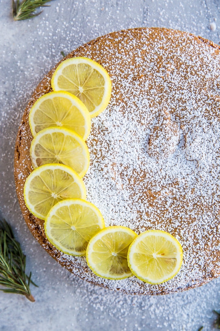 Olive Oil Cake with lemon and rosemary. Grain-free, refined sugar-free, dairy-free, and healthy. A delicious gluten-free cake recipe.