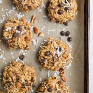 6-Ingredient No-Bake Kitchen Sink Cookies with peanut butter, oats, shredded coconut, pecans, and chocolate chips are the easiest, dreamiest no-cook egg-free cookies! Vegan, gluten-free, and refined sugar-free, these cookies are amazing for any occasion.