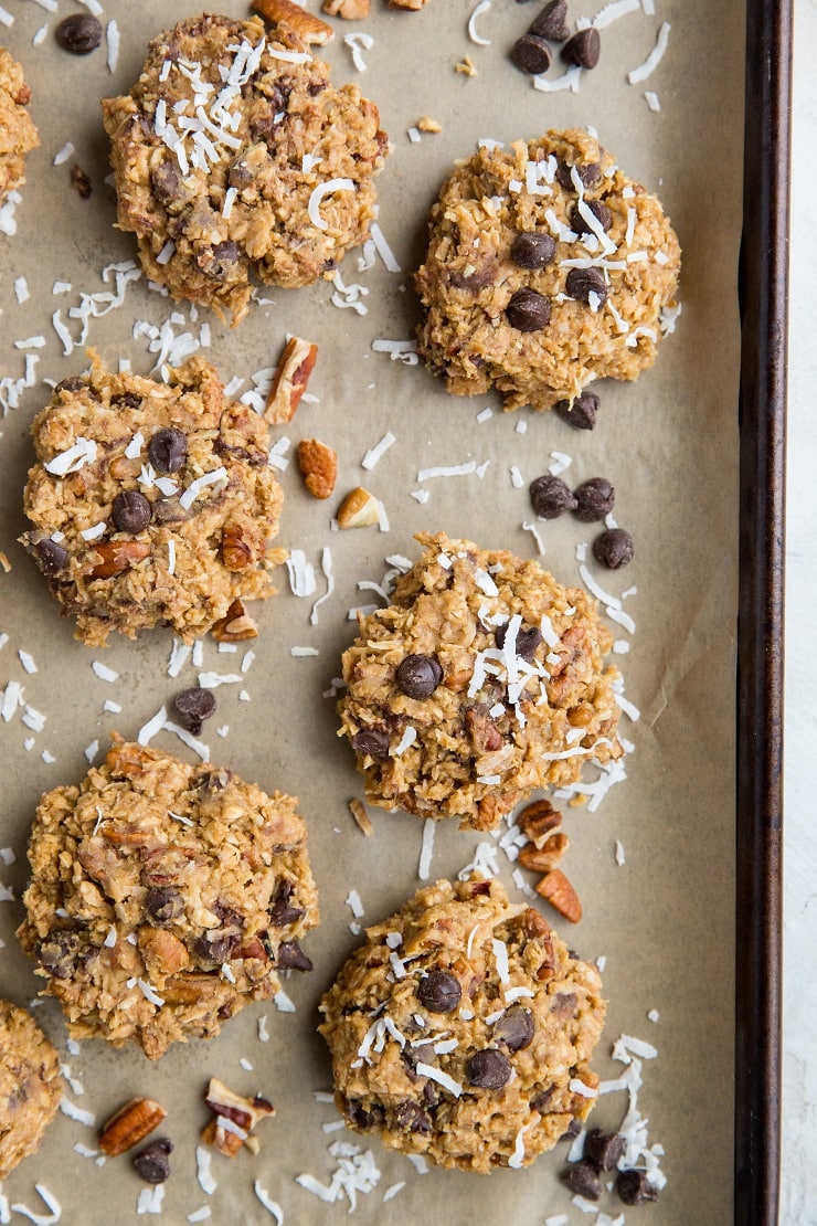 6-Ingredient No-Bake Kitchen Sink Cookies with peanut butter, oats, shredded coconut, pecans, and chocolate chips are the easiest, dreamiest no-cook egg-free cookies! Vegan, gluten-free, and refined sugar-free, these cookies are amazing for any occasion.