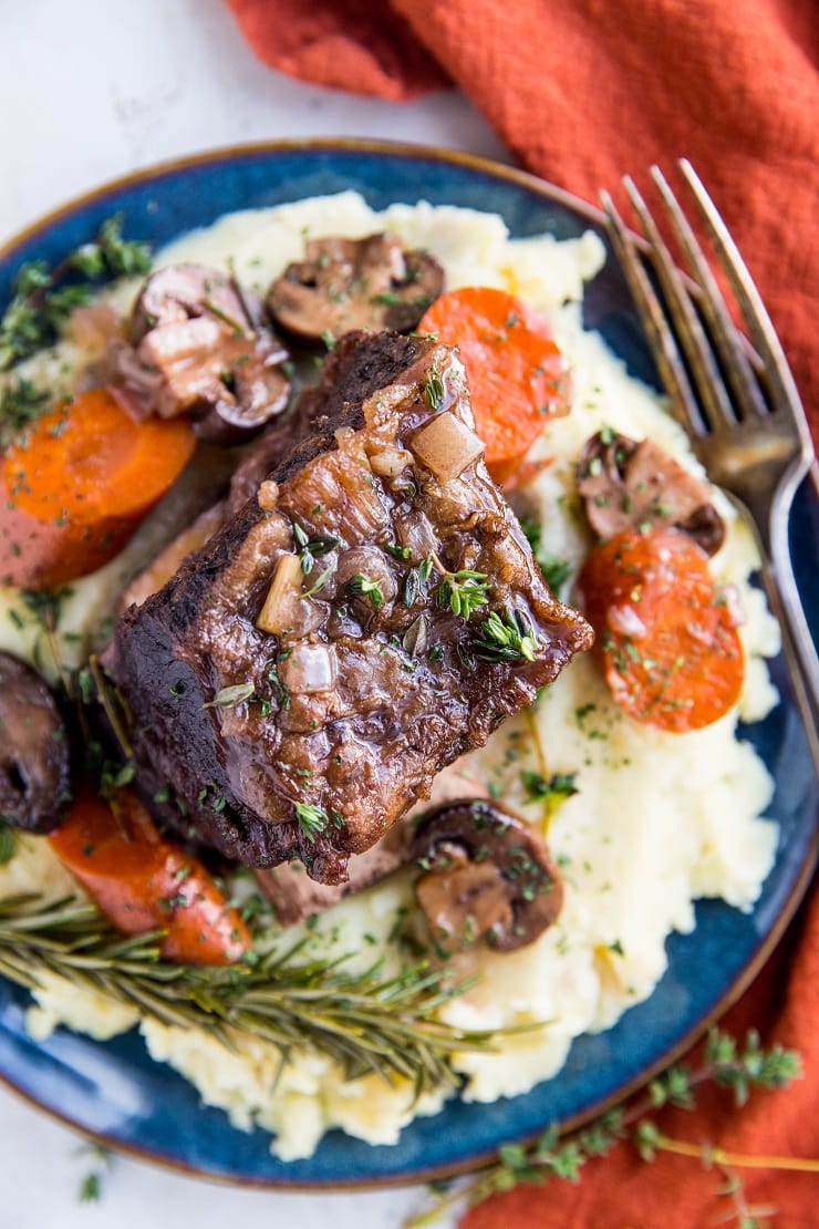 Perfect Slow Cooker Short Ribs are loaded with flavor and so tender! Serve them with mashed potatoes for an incredible meal.