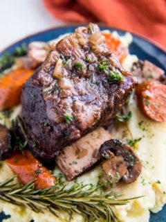 Amazing Crock Pot Short Ribs made with only a few simple ingredients. Cherry juice makes these short ribs unbelievably amazing.