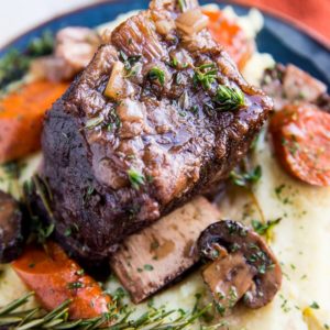 Amazing Crock Pot Short Ribs made with only a few simple ingredients. Cherry juice makes these short ribs unbelievably amazing.