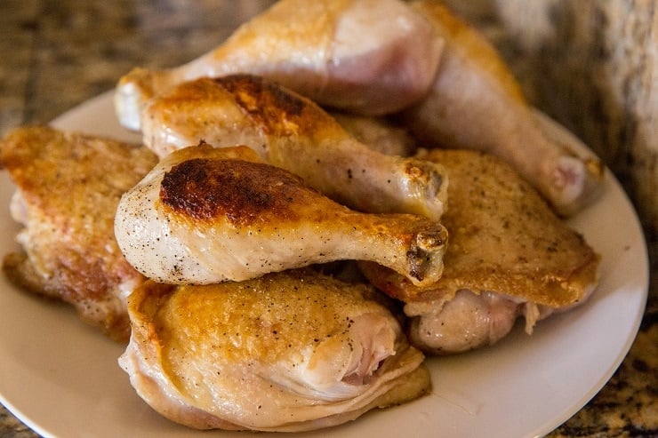 Place the seared chicken on a plate between batches