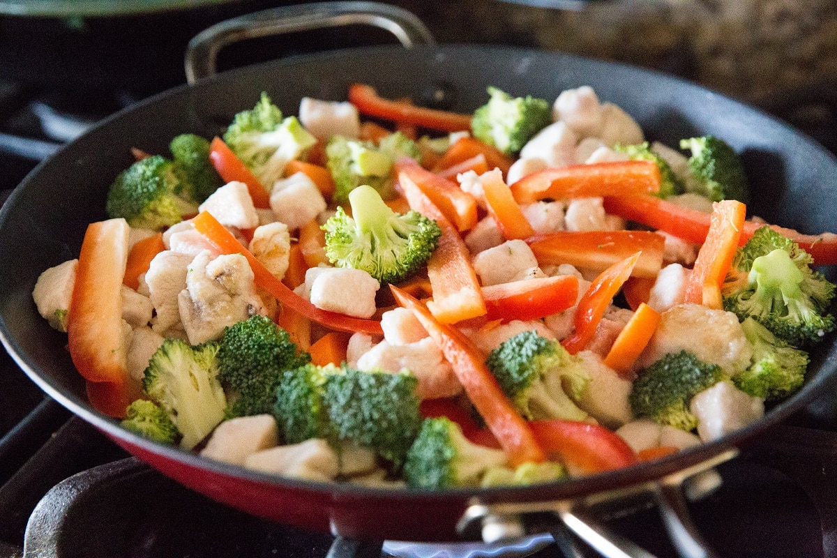 Stir the vegetables into the stir fry and cook for a few minutes.