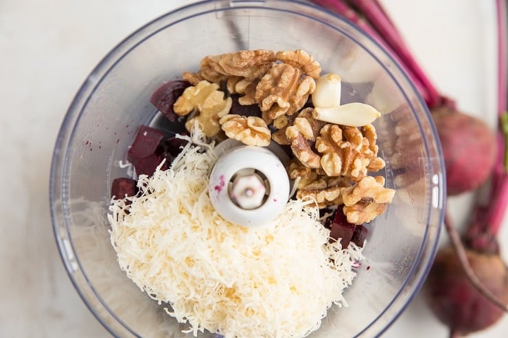 Transfer all of the ingredients for the pesto sauce to a food processor