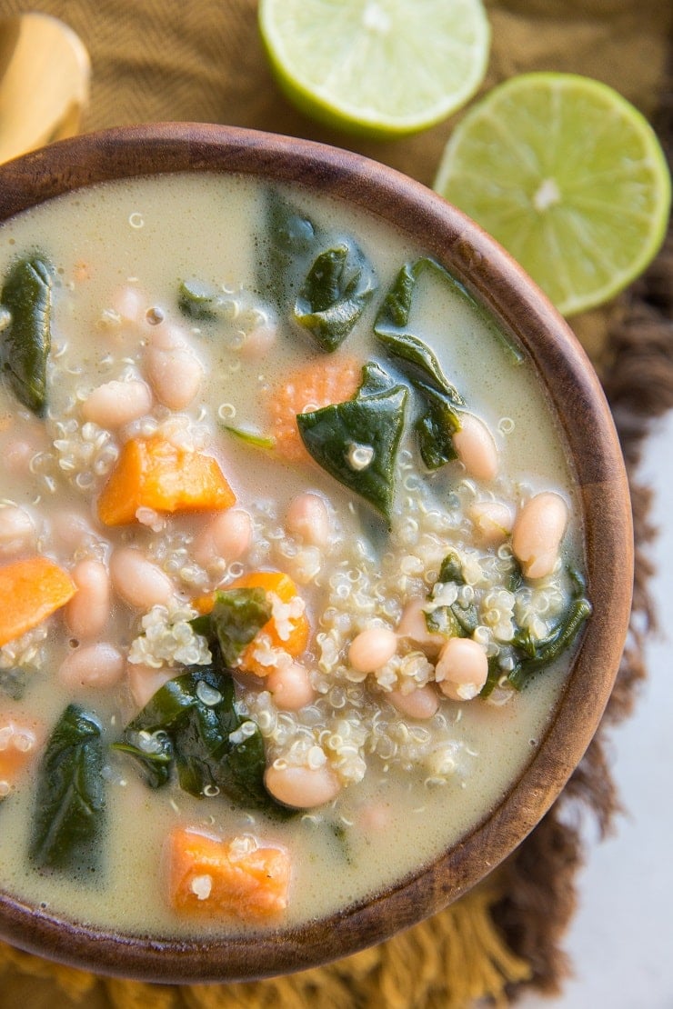 Vegan Sweet Potato and Quinoa Stew - a creamy dairy-free soup recipe with spinach, onion, and white beans. A flavorful nutritious recipe
