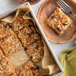 Vegan Carrot Cake Baked Oatmeal - gluten-free, dairy-free, egg-free, delicious baked oatmeal with grated carrots, pecans, shredded coconut, and raisins.