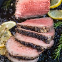 Garlic Herb Roast Beef cooked to perfection. Make a garlic herb compound butter for the ultimate dining experience.