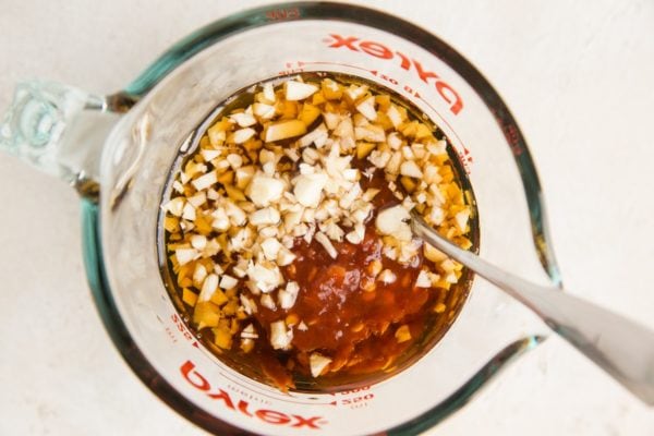 Ingredients for Beijing Beef Sauce in a measuring cup