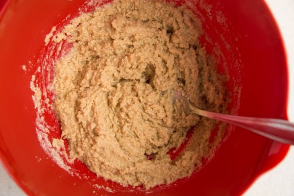 Cookie dough mixed together in a mixing bowl