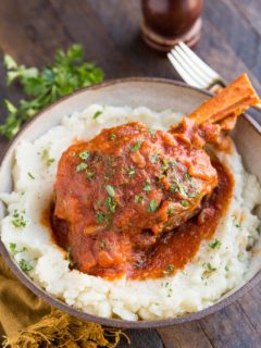 Instant Pot Lamb Shanks - an easy method for braising lamb shanks in a delicious tomato based sauce.