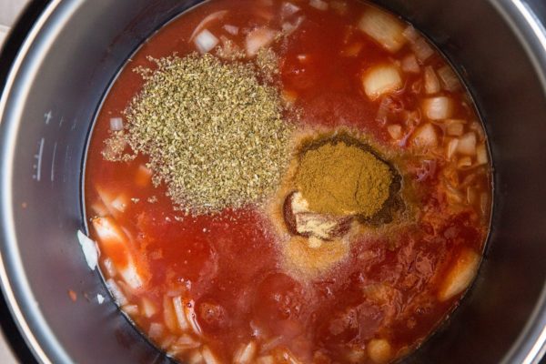 Ingredients for the sauce in a pressure cooker