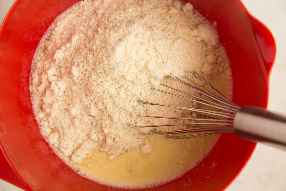 Mixing bowl with wet ingredients and dry ingredients poured in