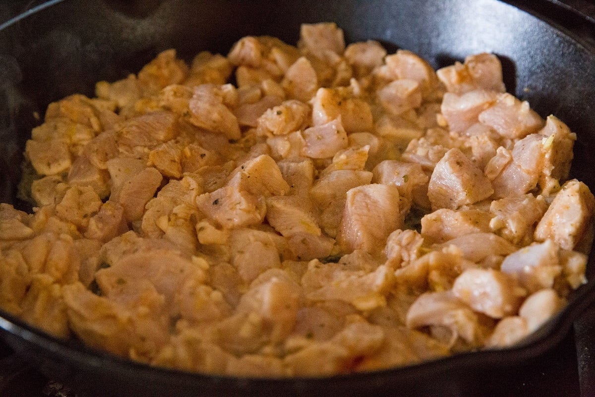 Transfer the chicken to a cast iron skillet and brown for 5 minutes.