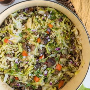 Easy One-Pot Ground Beef and Cabbage with onion, garlic, bell pepper, and mushrooms. An easy healthy low-carb dinner recipe that comes together in 30 minutes.