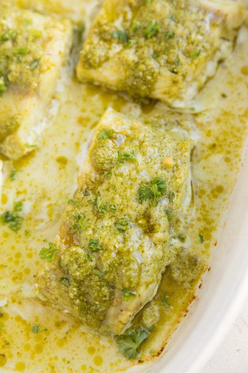 Baked pesto cod in a casserole dish