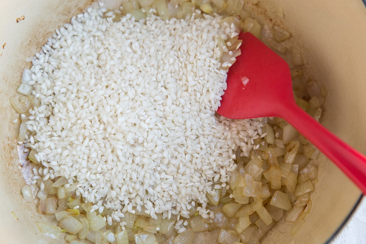 Add the arborio rice to the pot and stir well