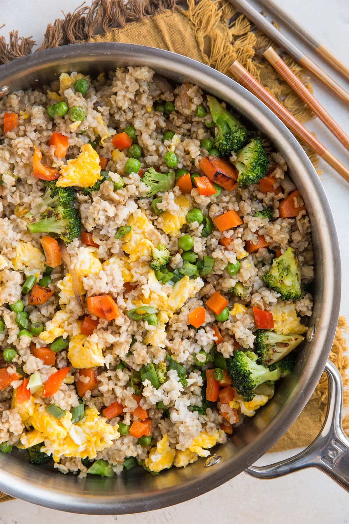 Easy Healthy Vegetable Fried Rice with brown rice, carrots, peas, bell pepper, and more