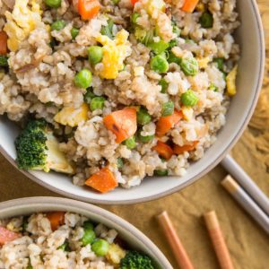 Vegetable Fried Rice with broccoli, bell pepper, peas, and carrots. a veggie-loaded rice experience