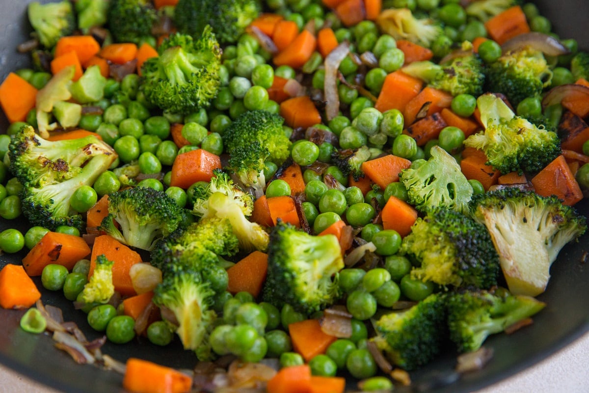 Sauté the vegetables in a skillet 