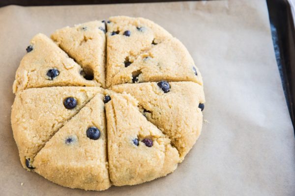 Disc of scone dough cut into 8 equal triangles