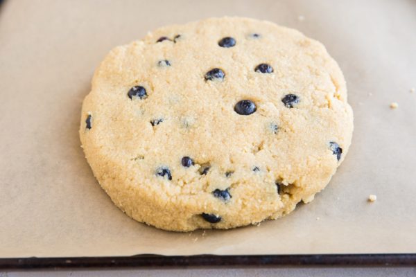 disc of scone dough on a parchment-lined baking sheet