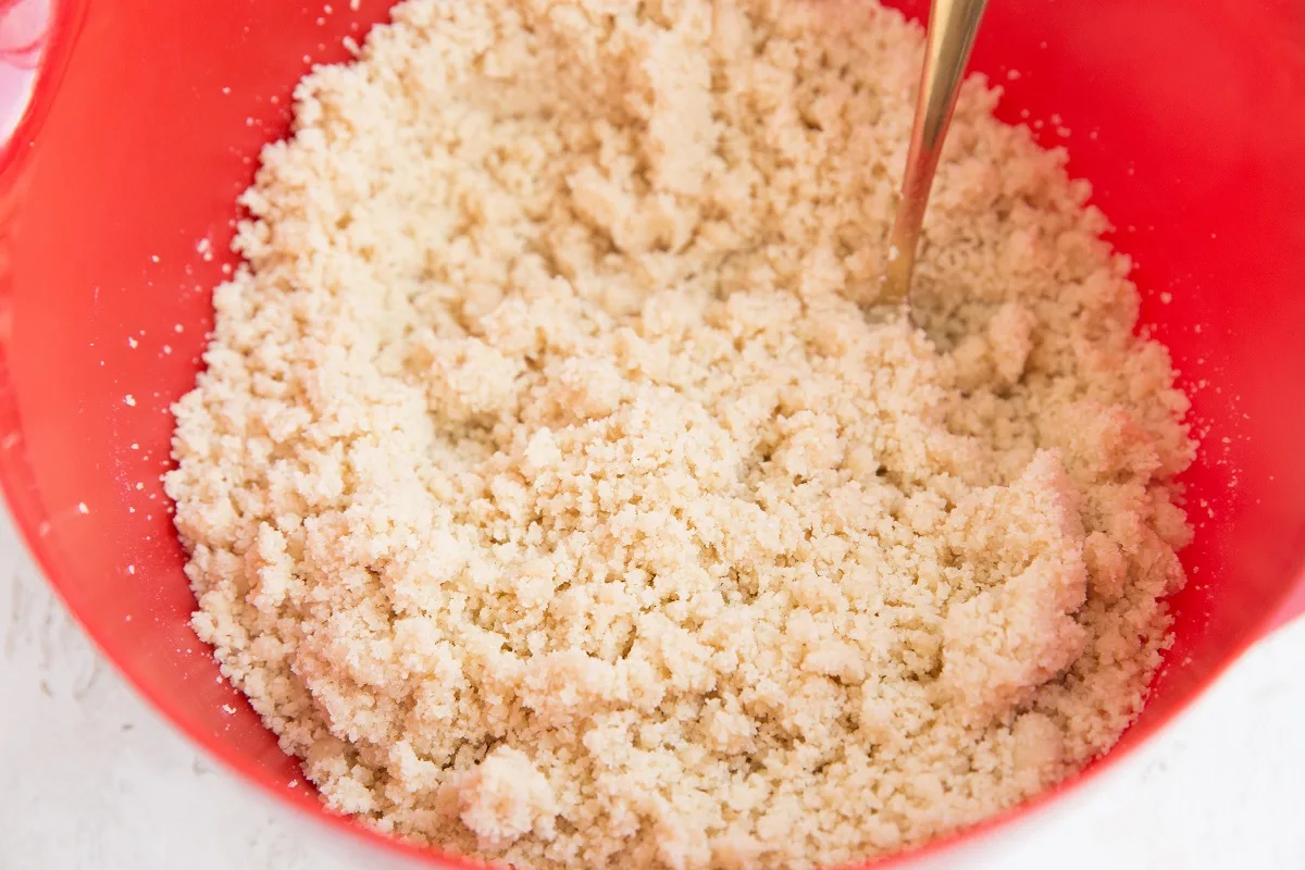 Ingredients for almond flour shortbread crust in a mixing bowl
