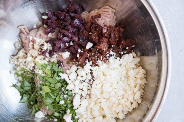 Ingredients for turkey meatballs in a mixing bowl