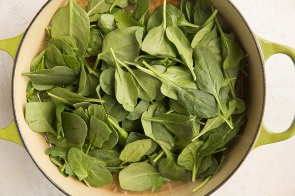 Spinach in a pot with chicken and potatoes