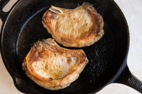 Seared pork in a cast iron skillet