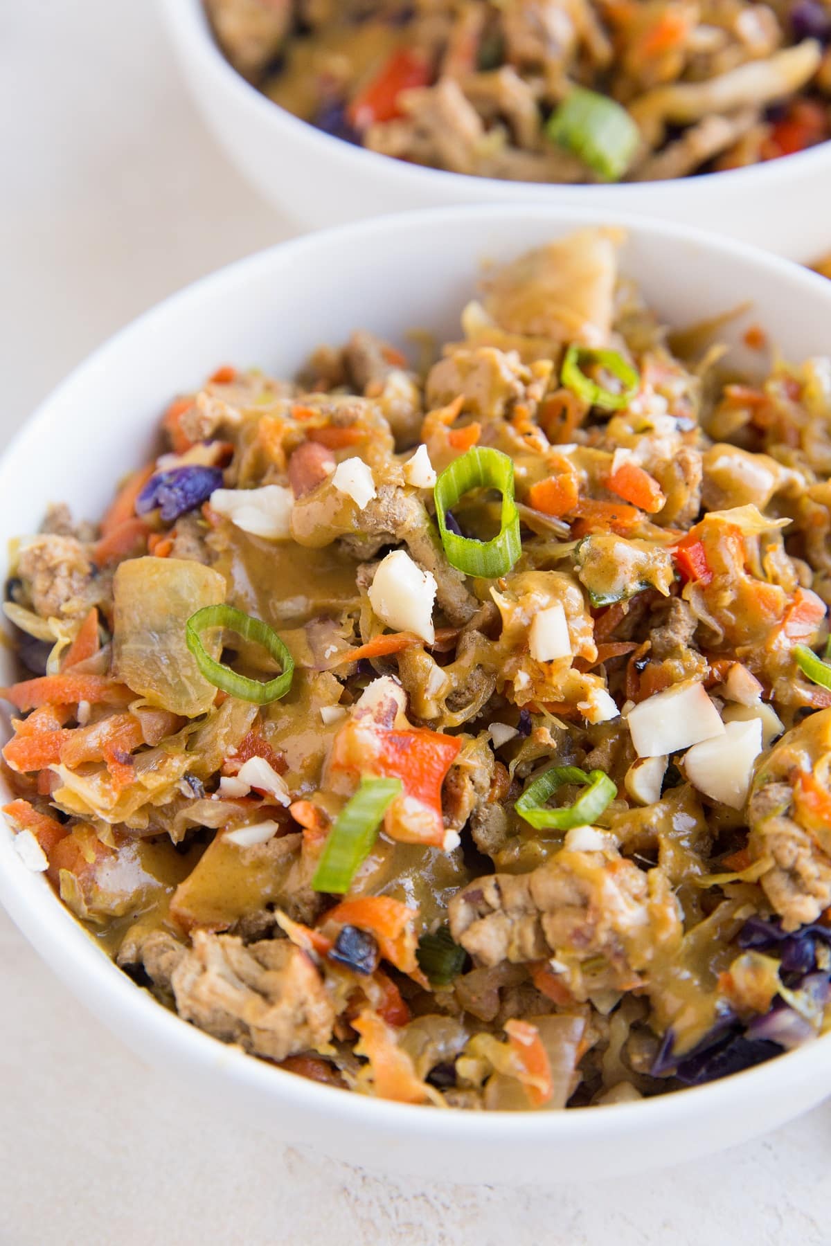 close up photo of ground turkey cabbage bowls with lots of veggies