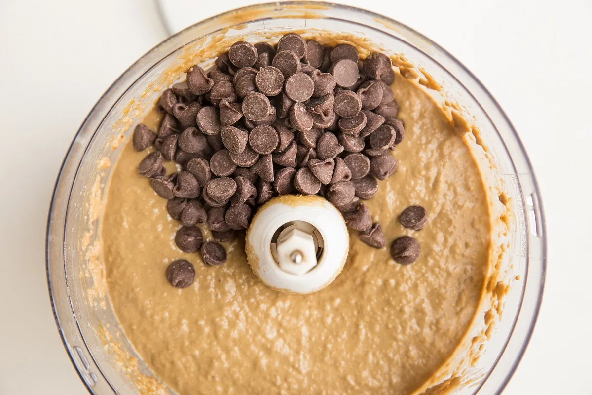 Chickpea bar batter in a food processor with chocolate chips