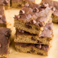 Stack of chickpea bars on parchment paper