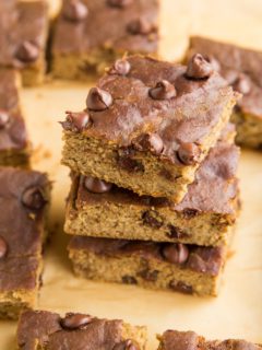 Stack of chickpea bars on parchment paper