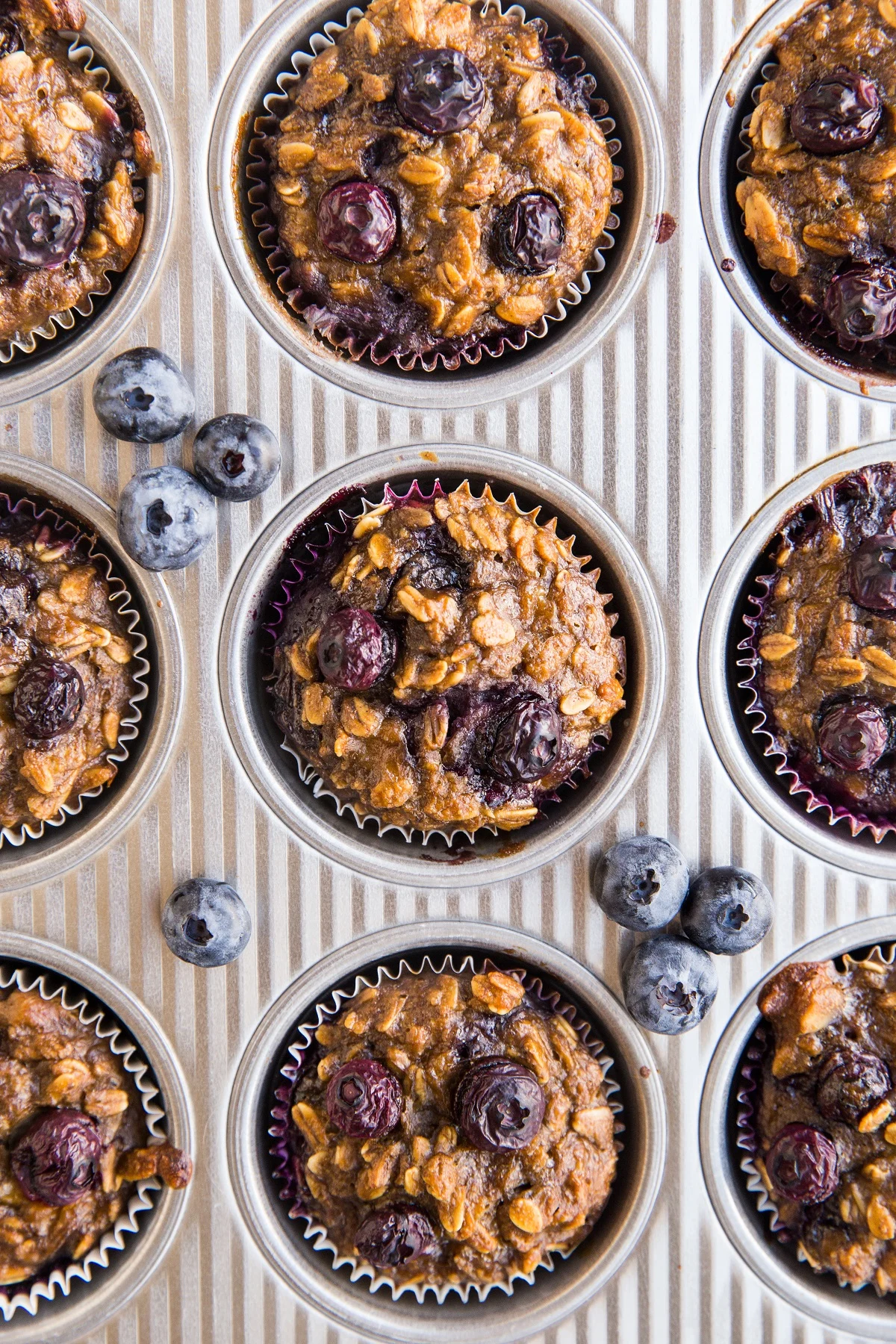 Top down photo of muffin tray of baked oatmeal cups