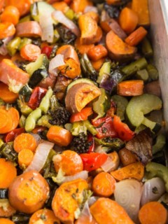Big batch of roasted veggies in a large roasting pan or casserole dish