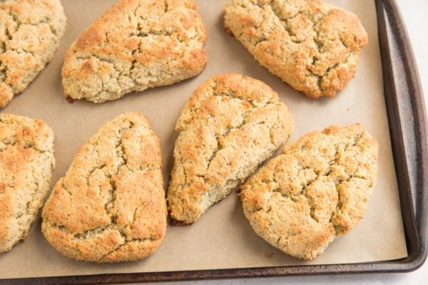 Finished scones on a baking sheet fresh out of the oven.