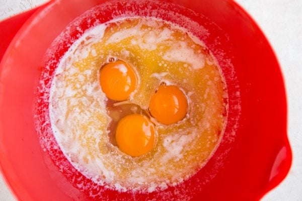 Wet ingredients for cake in a mixing bowl