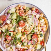 Big bowl of chickpea salad with fresh vegetables