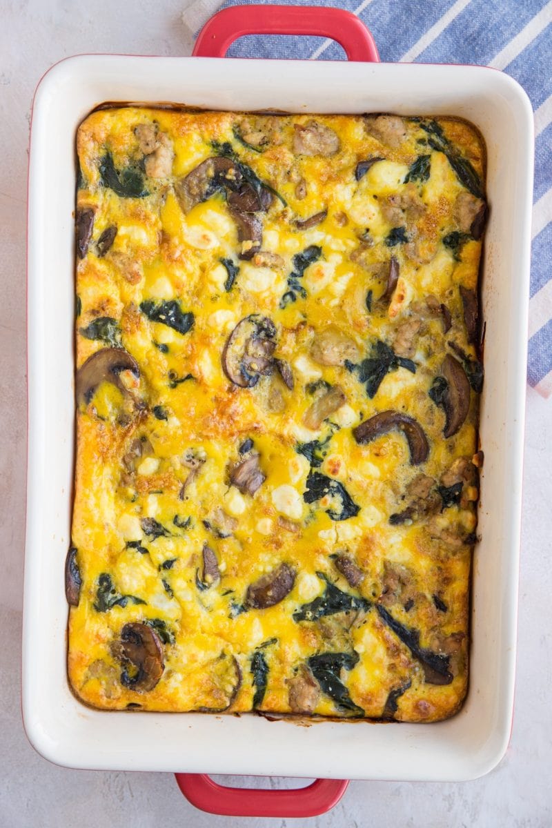 finished sausage and mushroom breakfast casserole fresh out of the oven in a casserole dish.