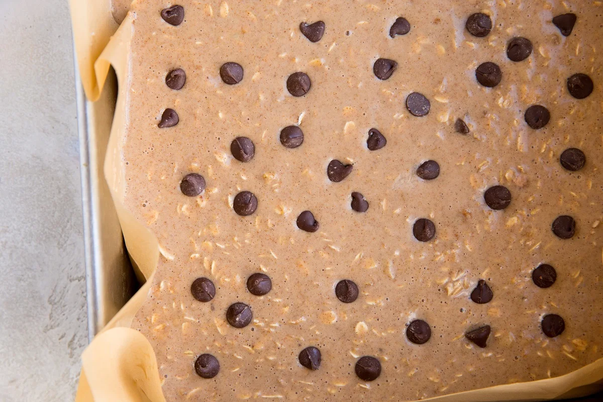 Pour mixture into a parchment-lined baking pan.