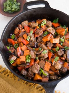 Sweet Potato Steak Tips in a cast iron skillet