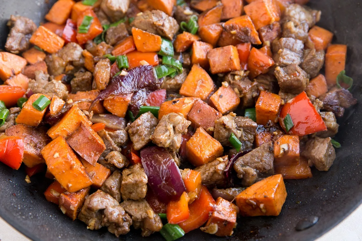 Finished steak tips in a skillet