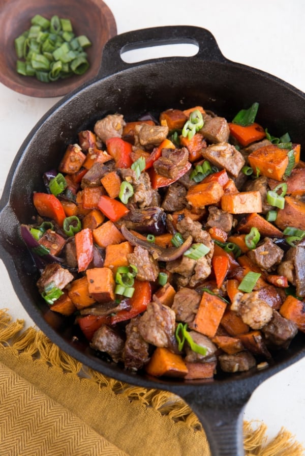 Sweet Potato Steak Tips in a cast iron skillet