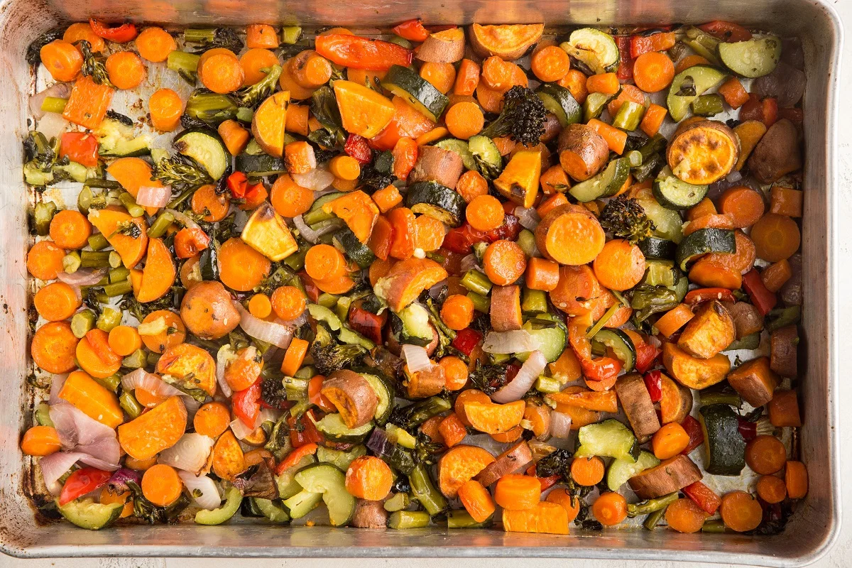 horizontal photo of roasted vegetables right out of the oven.