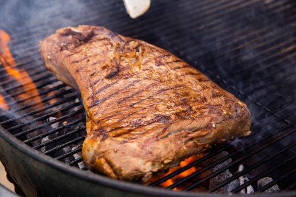 Seared tri tip on a charcoal grill