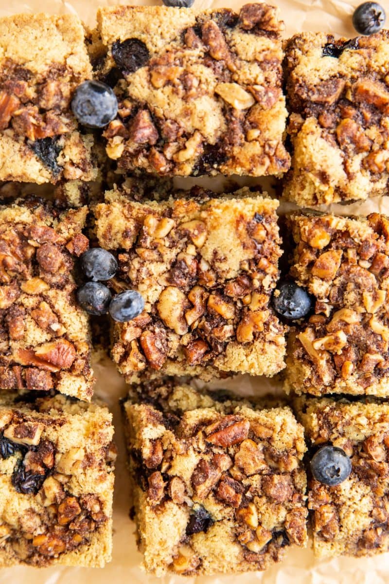 Top down photo of sliced coffee cake on parchment